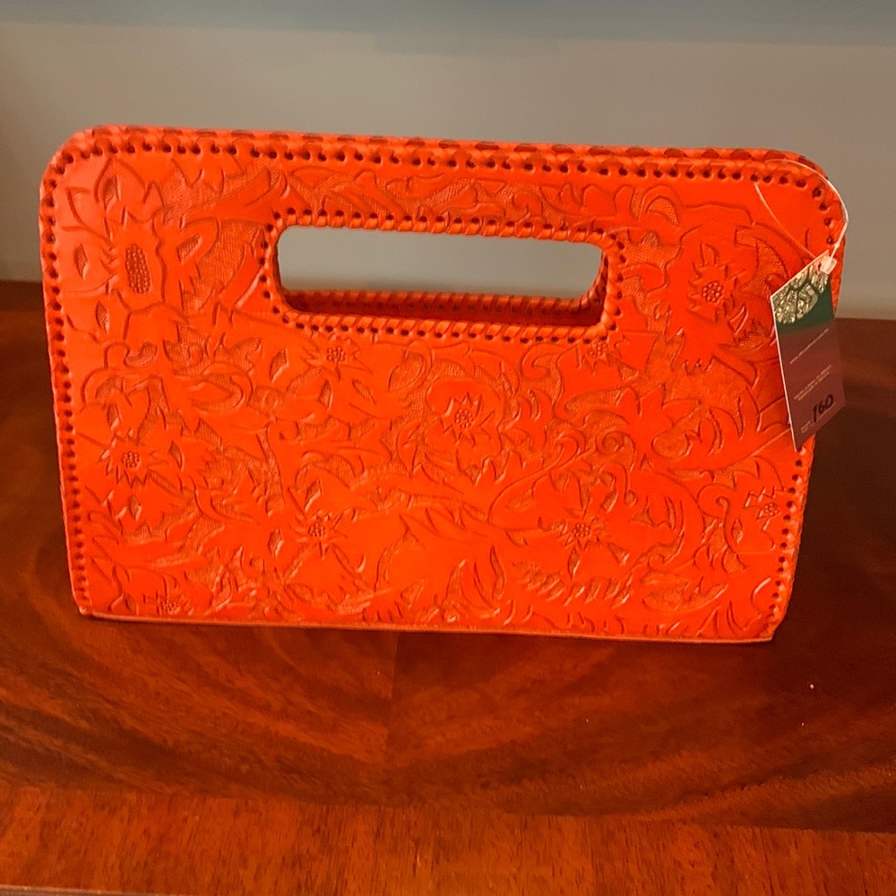 Alexis David orange clutch bag